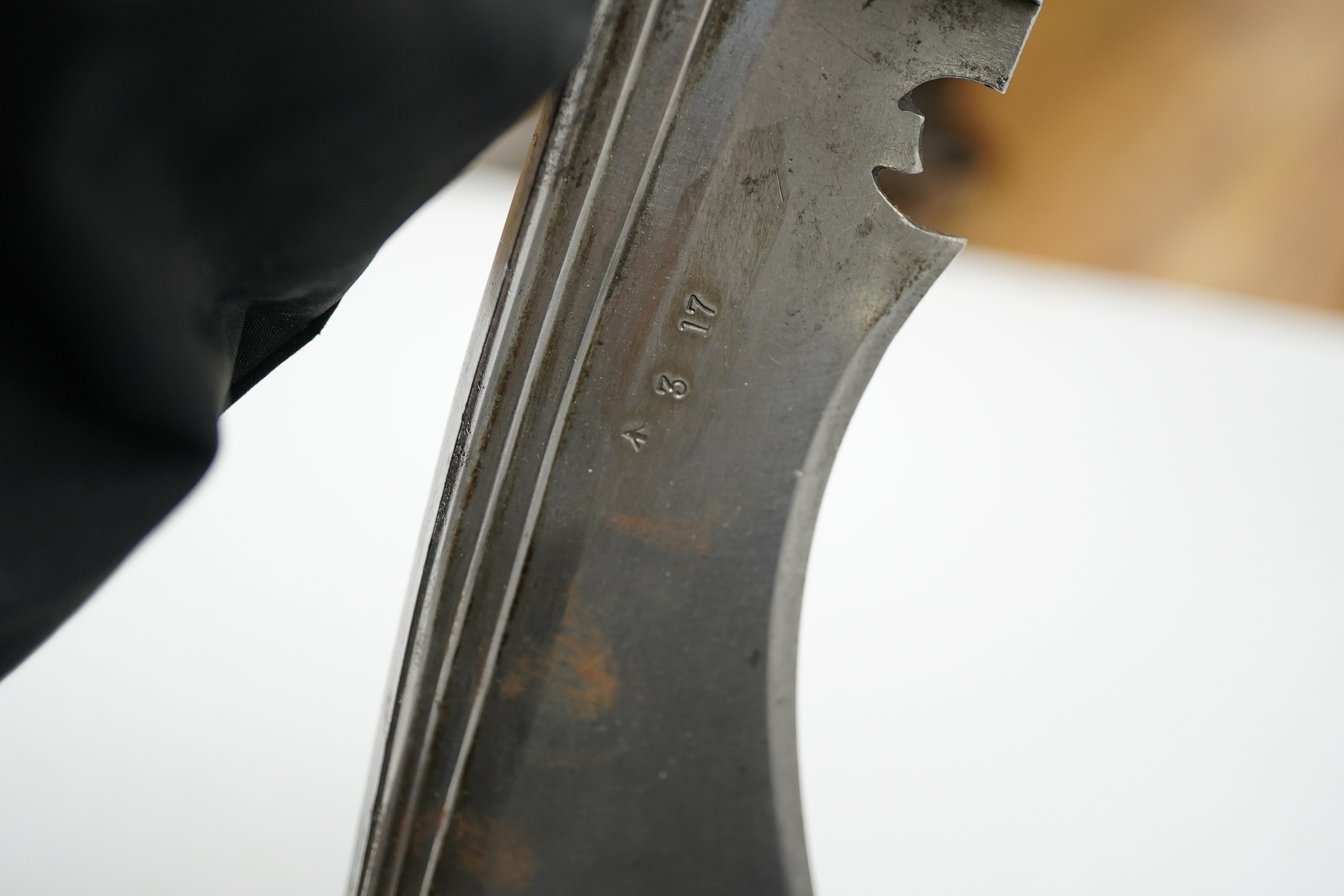 Two military kukri; one with blade stamped with British government ownership mark and issue date February 1916, with wooden handle, no scabbard and another almost identical with board of ordnance mark issued March 1917.